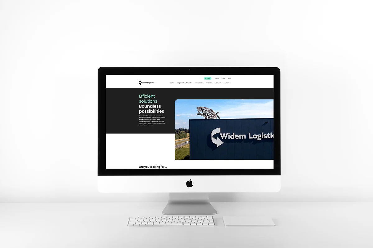 De nieuwe website van Widem Logistics op een computerscherm.